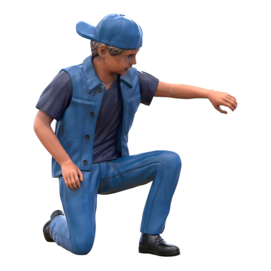 Productfoto diorama en modelbouw miniatuur figuur: jongen knielend