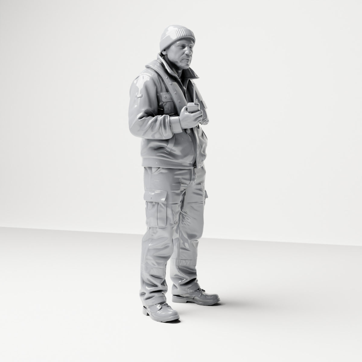 Diorama-modelbouw productfoto 3: Staande figuur: scheepsbemanning met pet, reddingsvest & radio (B053)