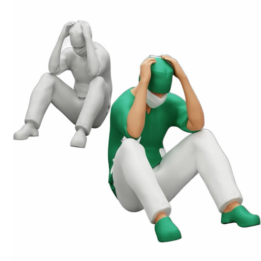 Diorama modelbouw productfoto 0: Denkende chirurg na mislukte ingreep zit op de grond (Ref Nr. A31)