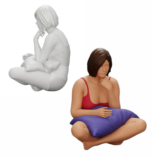 Diorama modelbouw productfoto 0: Meisje zit voor de televisie met kussens op haar benen (Ref Nr. A36)