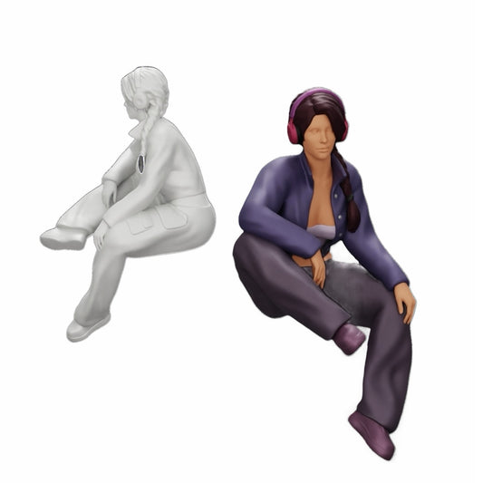 Diorama modelbouw productfoto 0: Jong meisje zit en luistert naar muziek met koptelefoon (Ref Nr. A42)