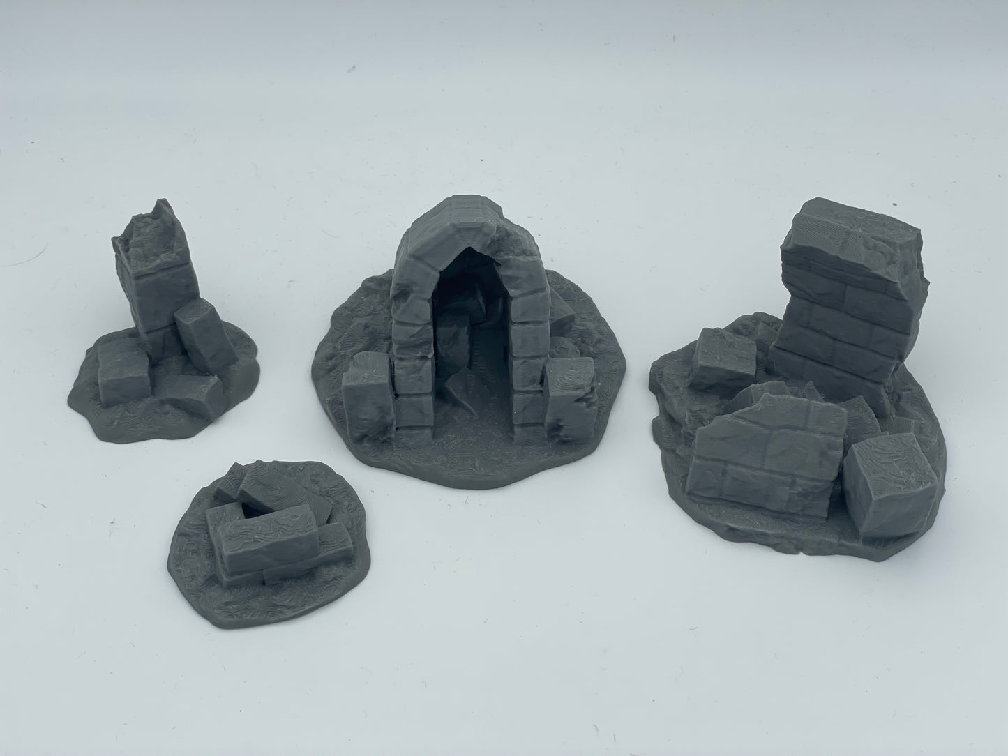 Produktfoto Tabletop 28mm The Printing Goes Ever On (TPGEO) 0: Ruinen A-D - Trümmer einer mittelalterlichen Stadt - Reste einer Mauer, Geröll und Steinhaufen