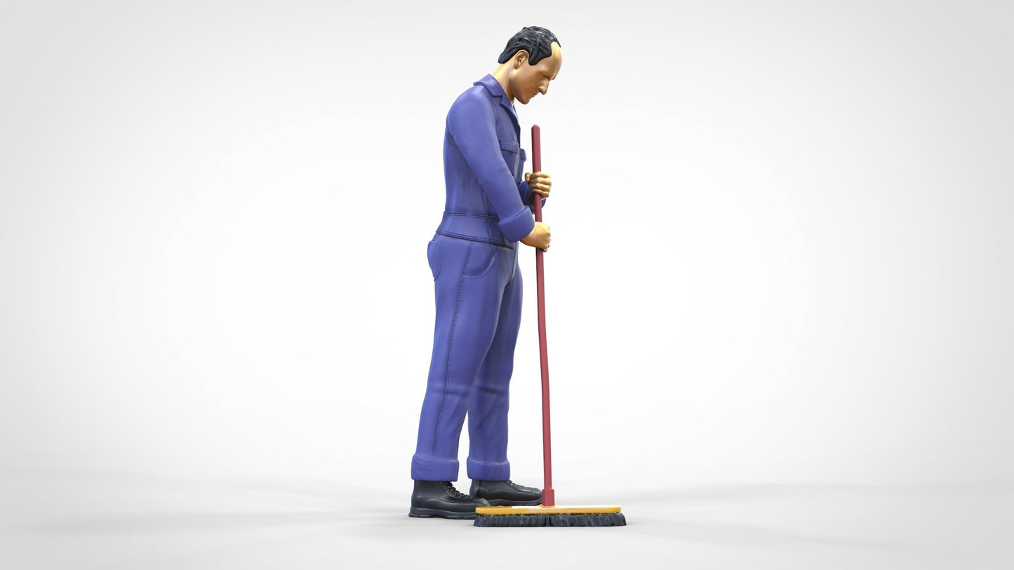 Productfoto 0: Huismeester of schoonmaker: man met bezem in overall