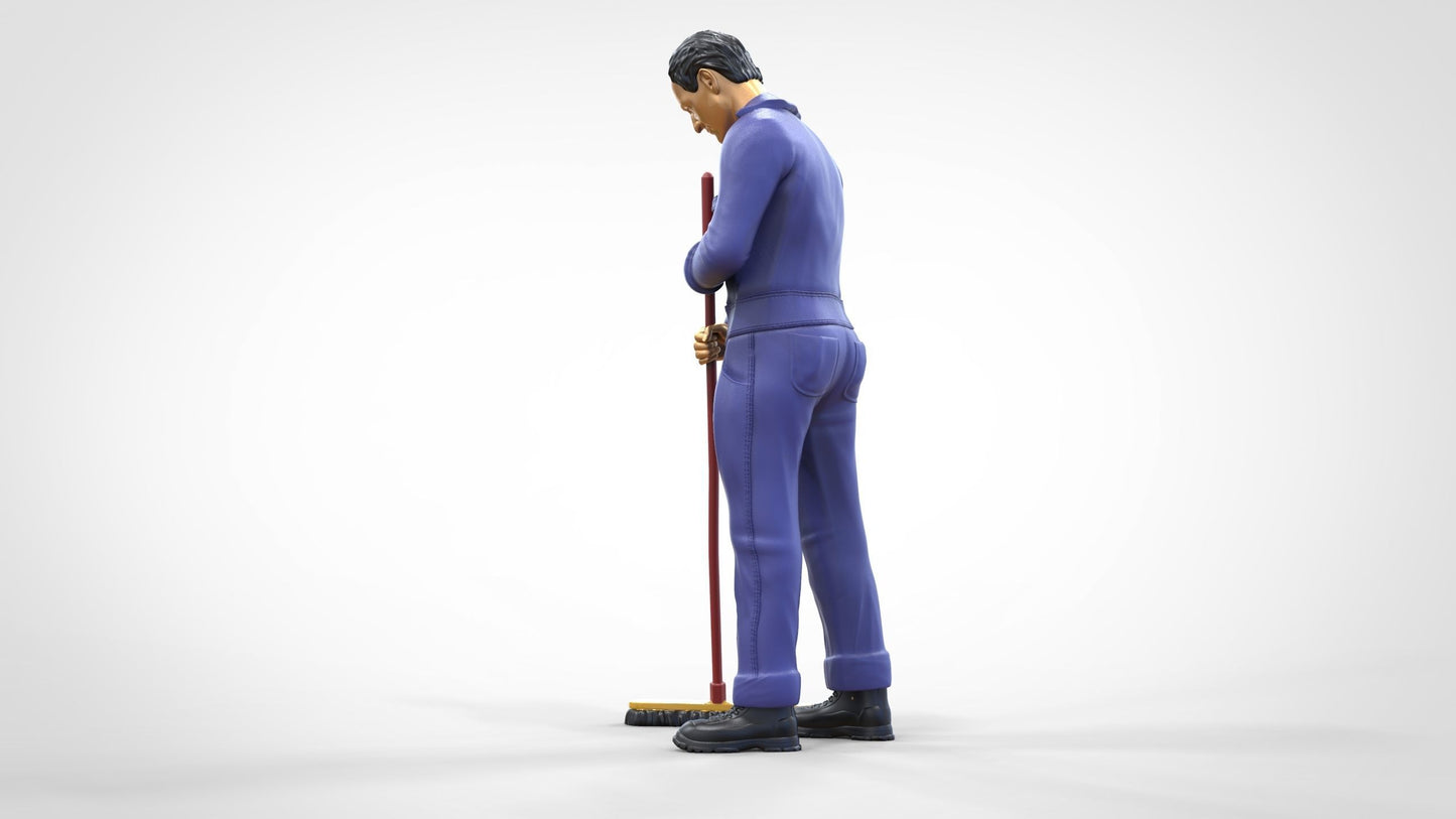 Productfoto 0: Huismeester of schoonmaker: man met bezem in overall