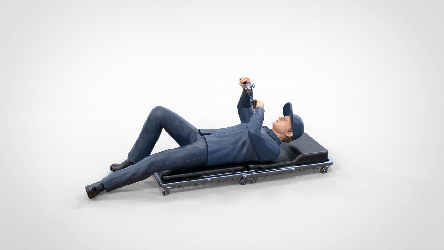 Produktfoto Diorama und Modellbau Miniatur Figur: Mechaniker auf Rollbrett