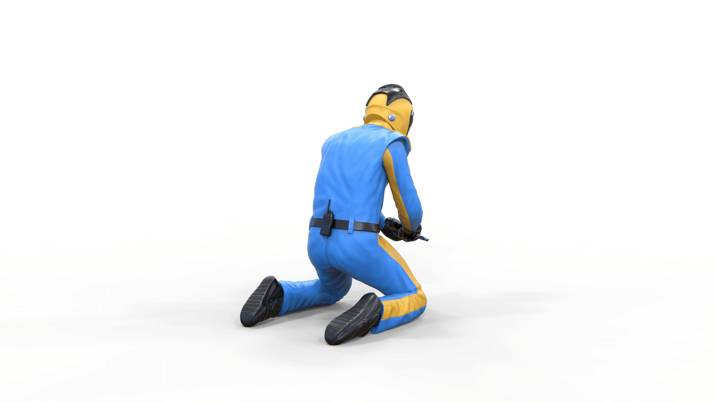 Productfoto Diorama en Modelbouw Miniatuurfiguur: Pit Crew - Monteur bij het Wielenwisselen 1