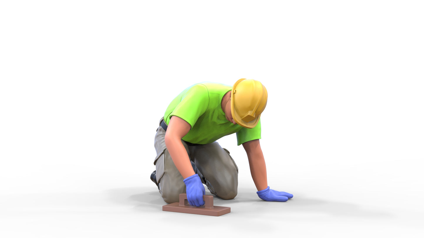Productfoto Diorama en modelbouw miniatuur figuur: Bouwvakker 1 - Tegelzetter knielend met helm
