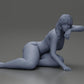 Diorama modelbouw productfoto 6: Miniatuurfiguur: Liggende vrouw in bikini, half gesteund op het strand (Ref Nr. A106)