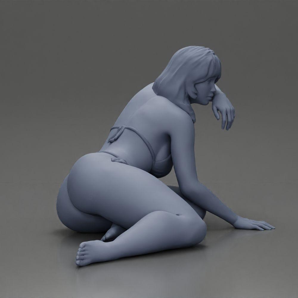 Diorama modelbouw productfoto 7: Miniatuurfiguur: Liggende vrouw in bikini, half gesteund op het strand (Ref Nr. A106)