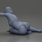 Diorama modelbouw productfoto 9: Miniatuurfiguur: Liggende vrouw in bikini, half gesteund op het strand (Ref Nr. A106)