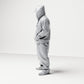 Diorama modelbouw productfoto 1: Staande figuur: Persoon met hoodie, pet & gezichtdoek, handen in de zakken (B034)