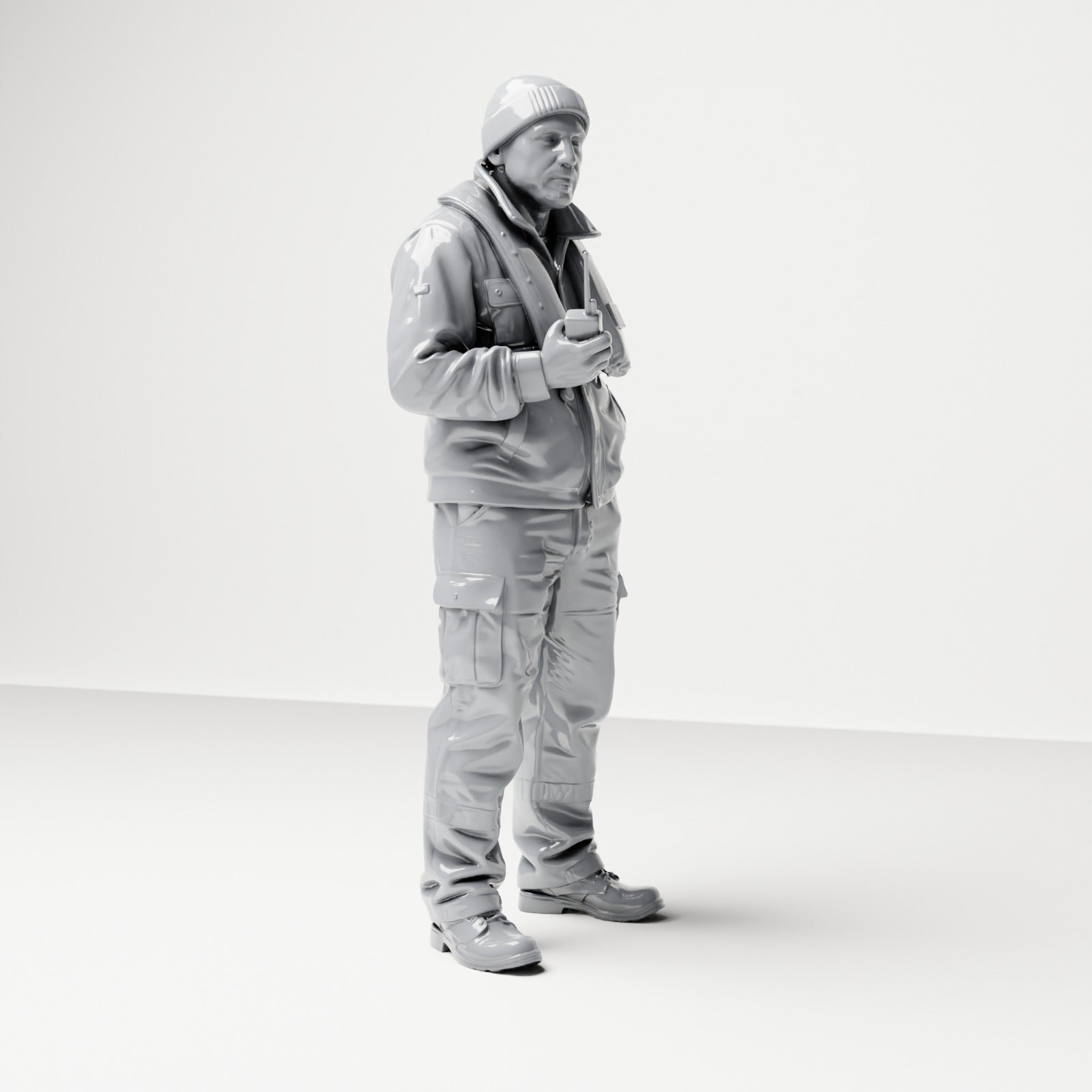 Diorama-modelbouw productfoto 3: Staande figuur: scheepsbemanning met pet, reddingsvest & radio (B053)
