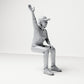 Diorama modelbouw productfoto 3: zittende figuur: toeschouwer met geheven arm (B059)