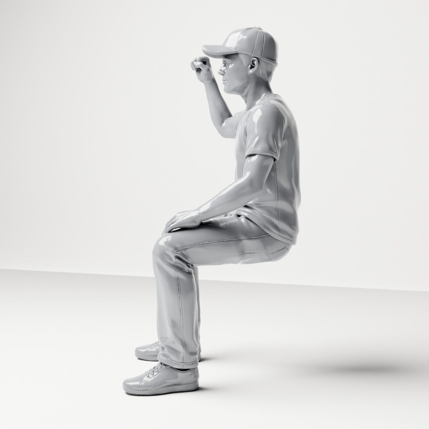 Diorama modelbouw productfoto 1: Zittende figuur: toeschouwer met geheven gebalde vuist (B066)