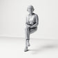Diorama modelbouw productfoto 0: zittende figuur: toeschouwster met gekruiste benen en gevouwen handen (B069)
