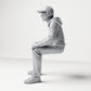 Diorama modelbouw productfoto 1: Zittende figuur: man met pet & hoodie (B070)