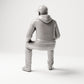 Sitzende Figur: Mann mit Kappe & Kapuzenpullover (B070) - Rueckansicht