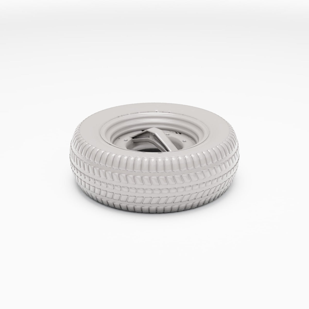 Productfoto diorama en modelbouw 2: Dioramawerkplaats: reservevrachtwagenband met velg (Ref. 1114D)