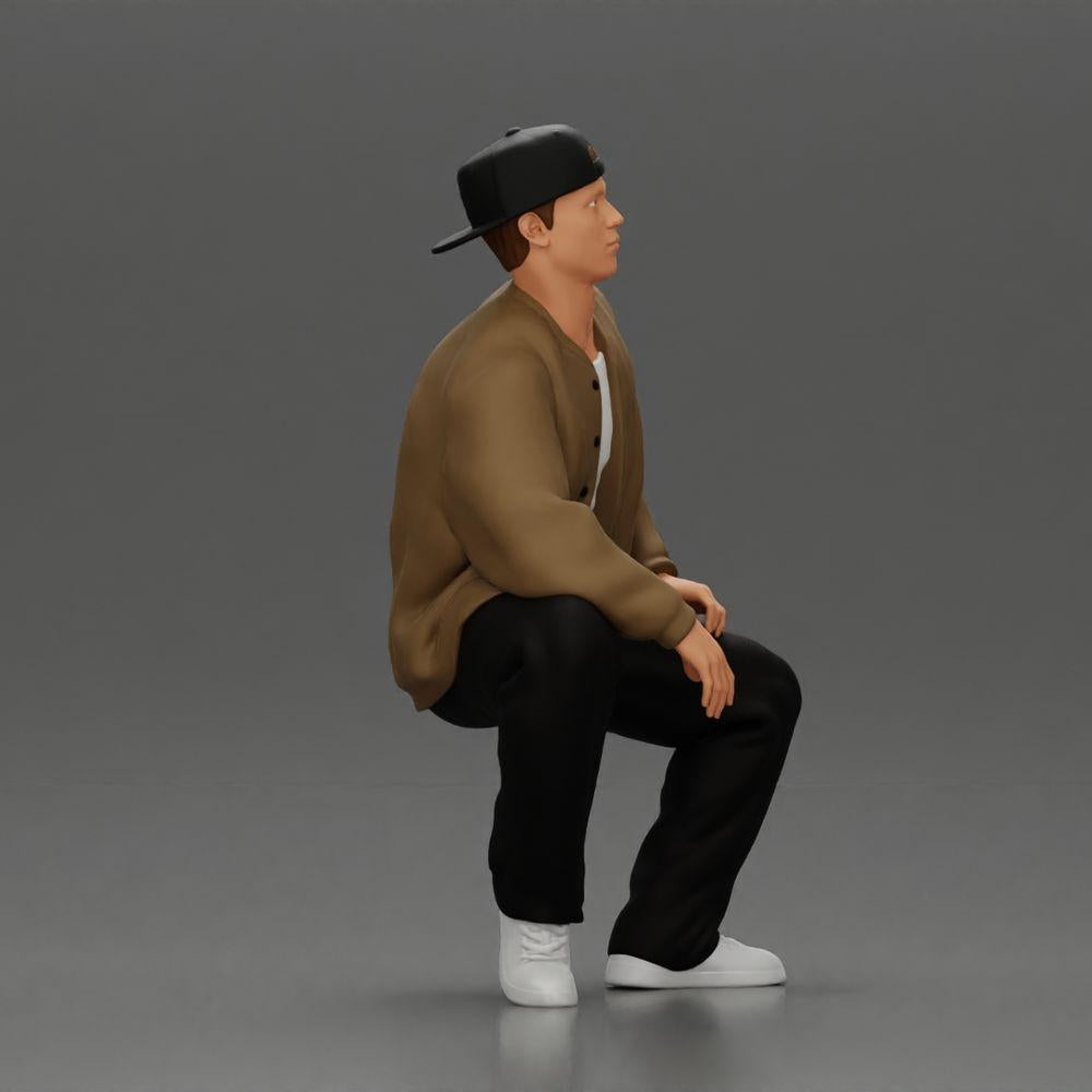 Diorama modelbouw productfoto 1: Diorama-figuur: Zittende hiphopman met jack, pet en sneakers (Ref Nr. A62)