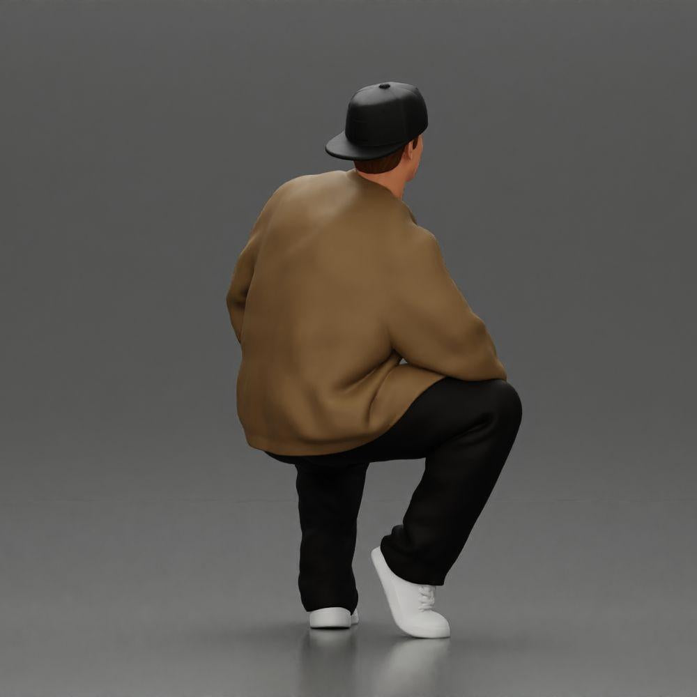 Diorama modelbouw productfoto 2: Diorama-figuur: Zittende hiphop-man met jas, pet en sneakers (Ref Nr. A62)
