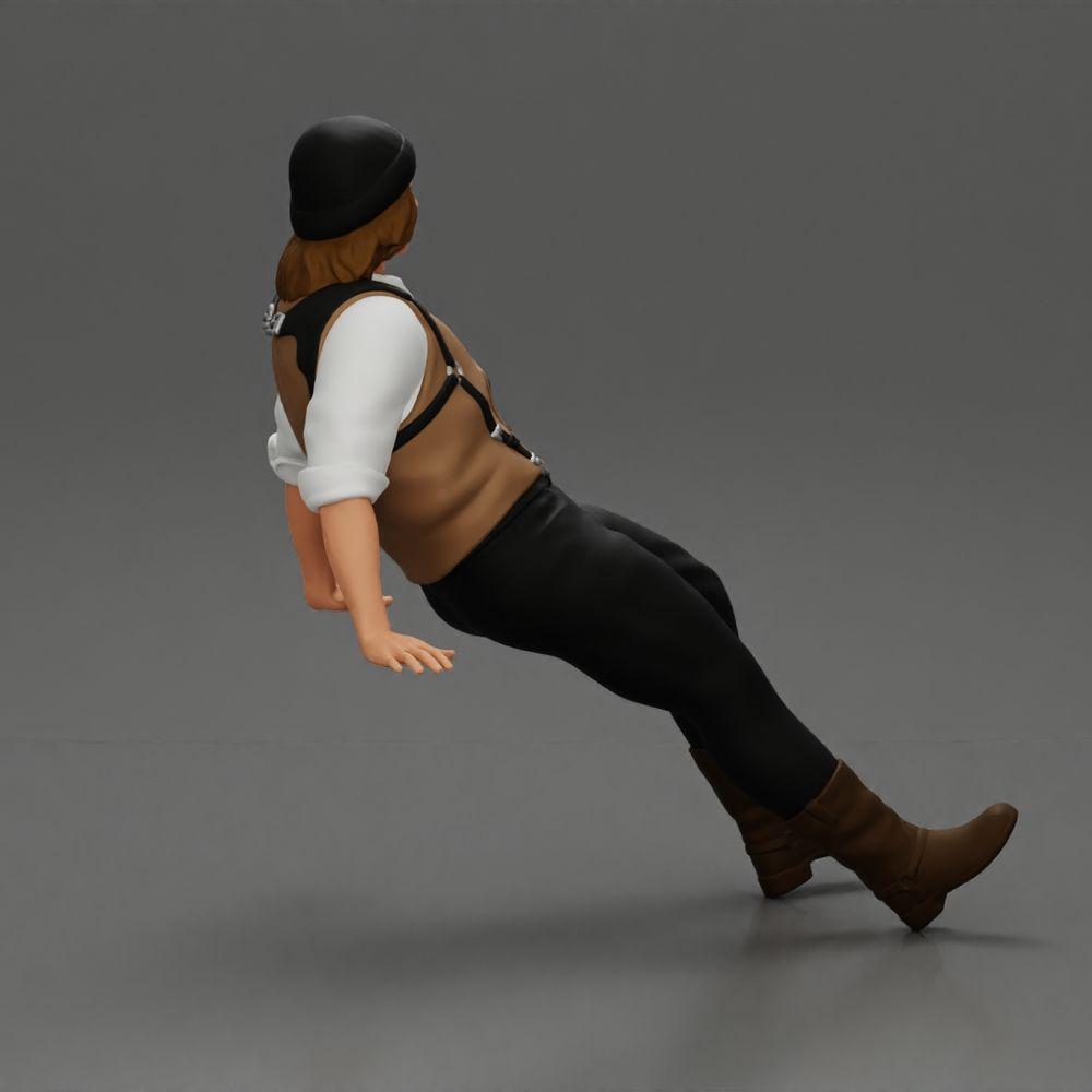 Diorama modelbouw productfoto 2: Zittende miniatuurfiguur, man in historische kleding met muts en bretels (Ref Nr. A84)