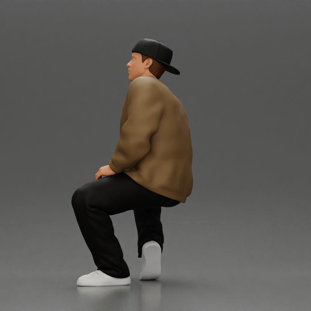 Diorama modelbouw productfoto 4: Diorama-figuur: Zittende hiphop-man met jas, pet en sneakers (Ref Nr. A62)