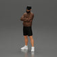 Diorama modelbouw productfoto 5: Figuur: Man met gekruiste armen, pet, jas, shorts, sportschoenen (Ref Nr. A125)
