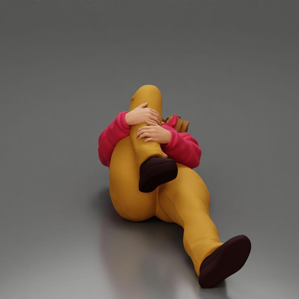 Diorama modelbouw productfoto 5: Liggende vrouw met minijack houdt gewond knie - Diorama-miniatuur (Ref Nr. A87)