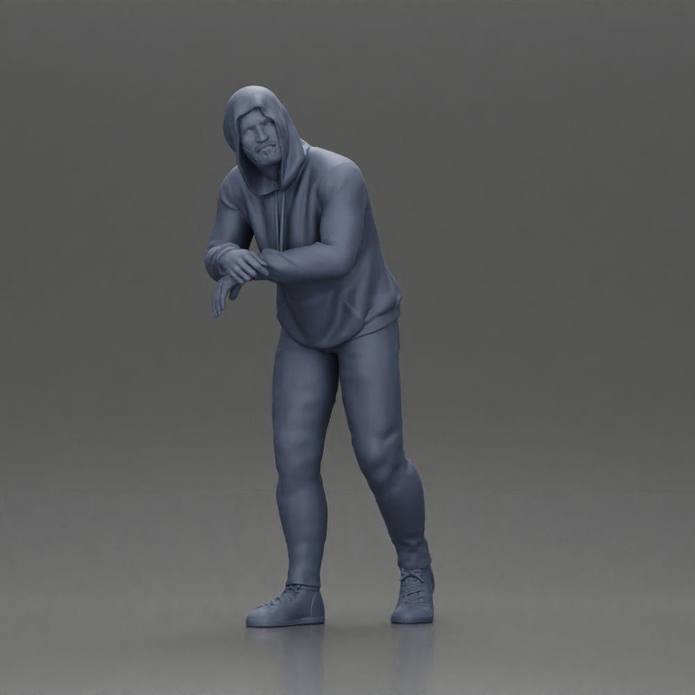 Diorama modelbouw productfoto 6: Diorama-figuur: Man met kap, handen op de auto, licht naar voren gebogen (Ref Nr. A115)