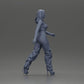 Diorama modelbouw productfoto 7: Diorama figuur: Miniatuur-figuur vrouw in looppose, groen-rood, kort topje, wijde broek, pumps (Ref Nr. A141)