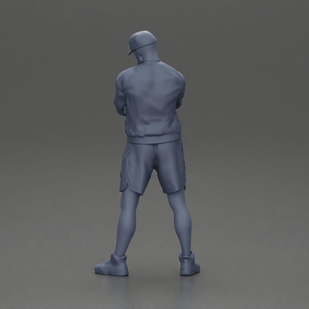 Diorama modelbouw productfoto 9: Figur: Man met gekruiste armen, pet, jas, shorts, sportschoenen (Ref Nr. A125)