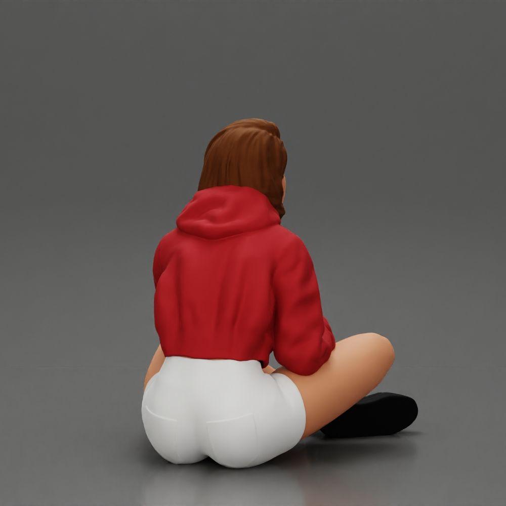 Diorama modelbouw productfoto 14: Diorama-miniatuur: Zittende vrouw in jas en shorts met open paraplu (Ref Nr. A85)