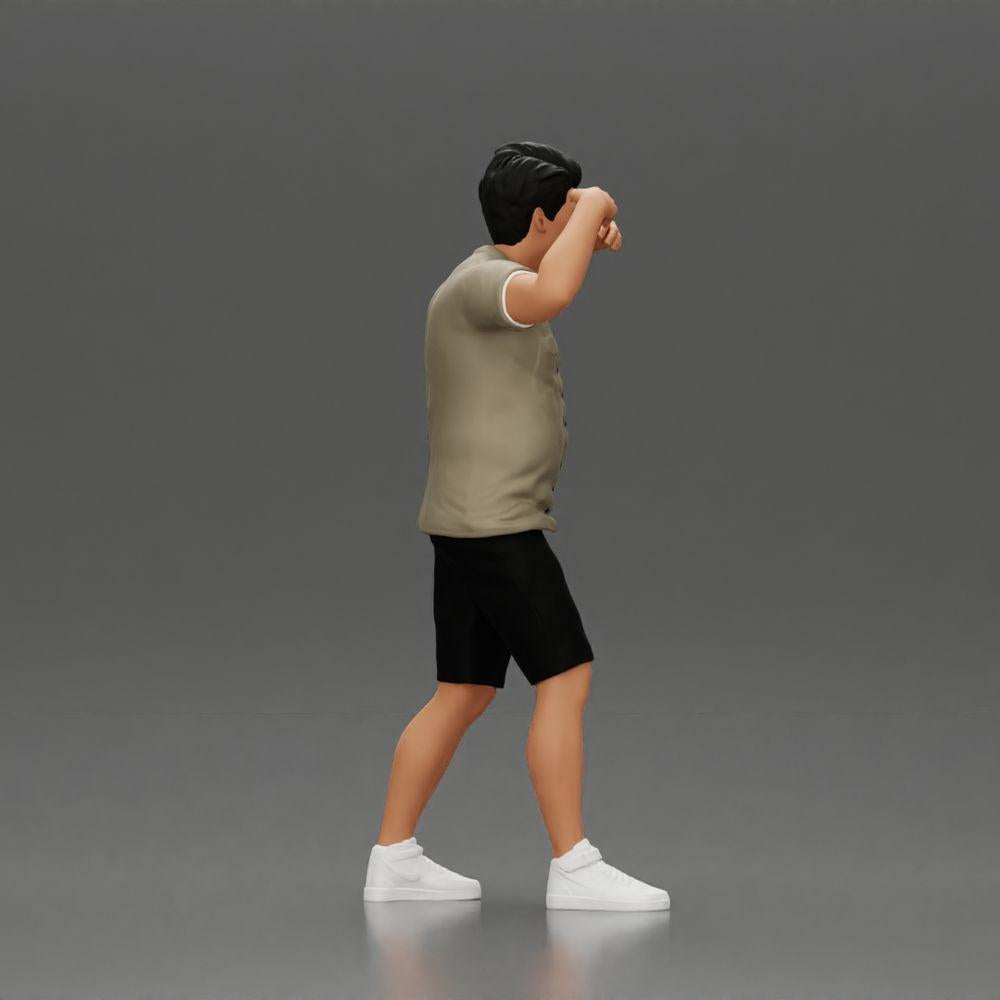 Diorama modelbouw productfoto 2: Diorama-miniatuur: Man in shirt en shorts draagt vrouw op schouders (Ref Nr. A81)