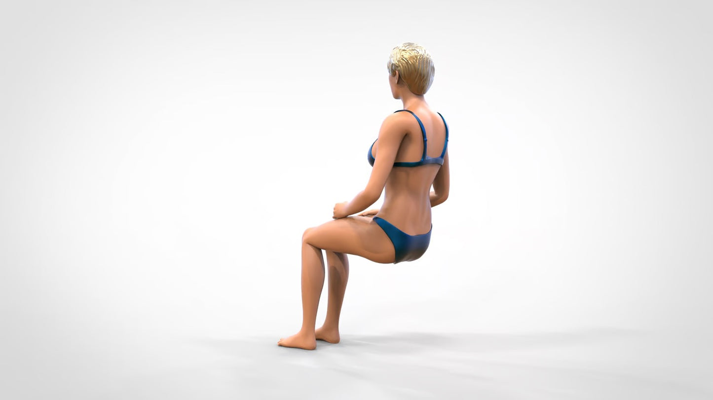Productfoto 0: Vrouw in bikini - zittend