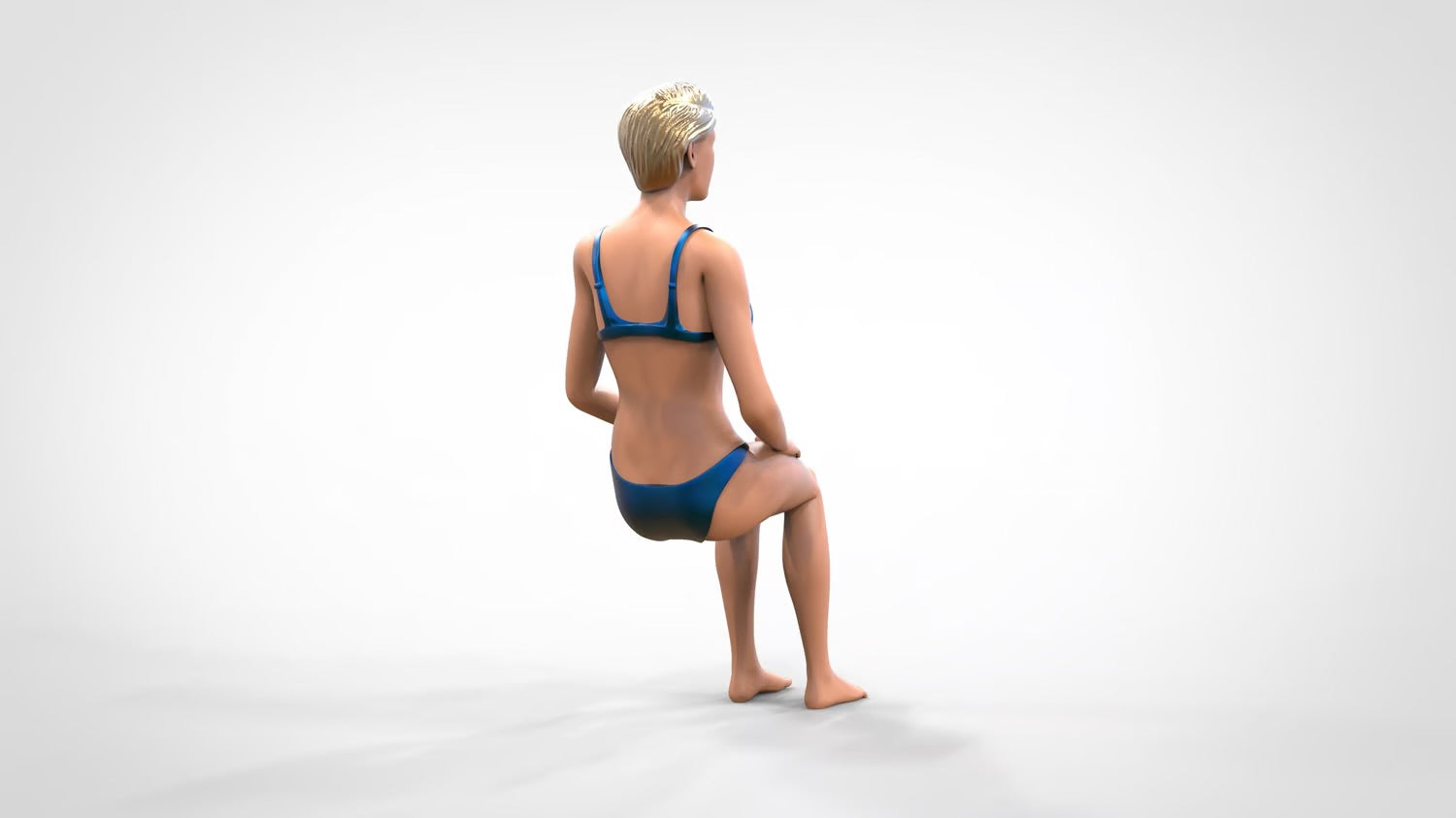 Productfoto 0: Vrouw in bikini - zittend