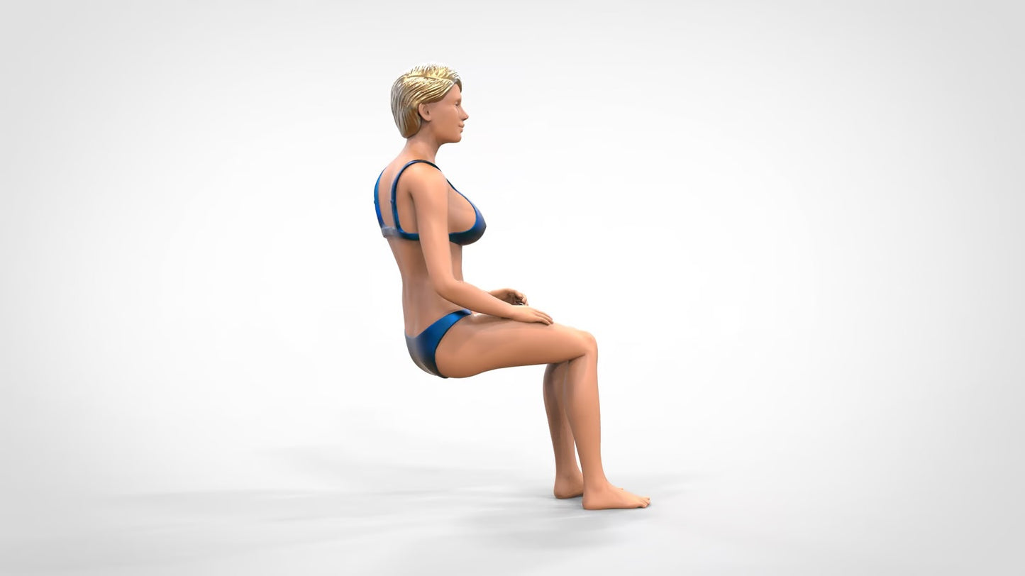 Productfoto 0: Vrouw in bikini - zittend