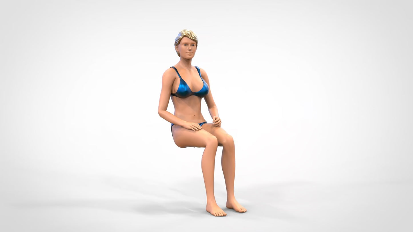 Productfoto 0: Vrouw in bikini - zittend