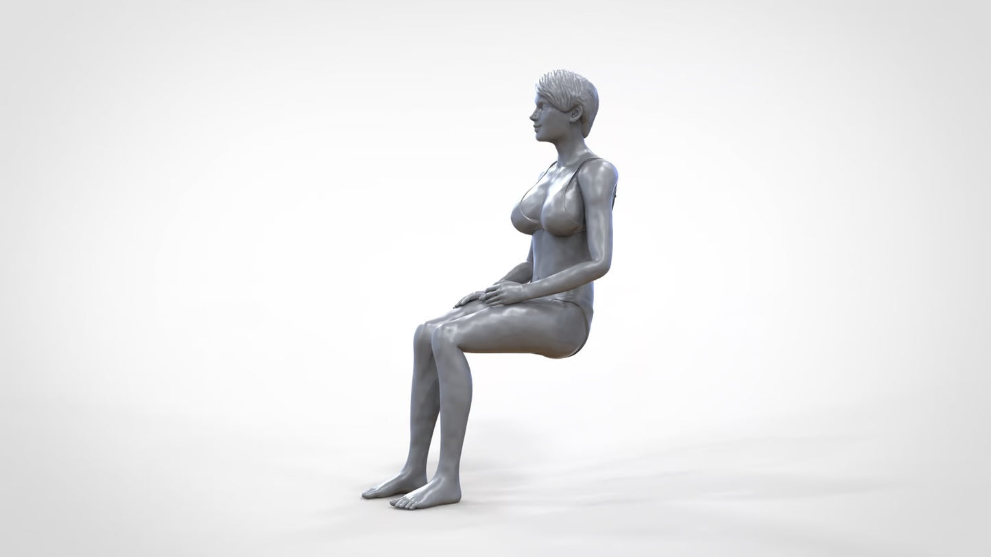 Productfoto 0: Vrouw in bikini - zittend