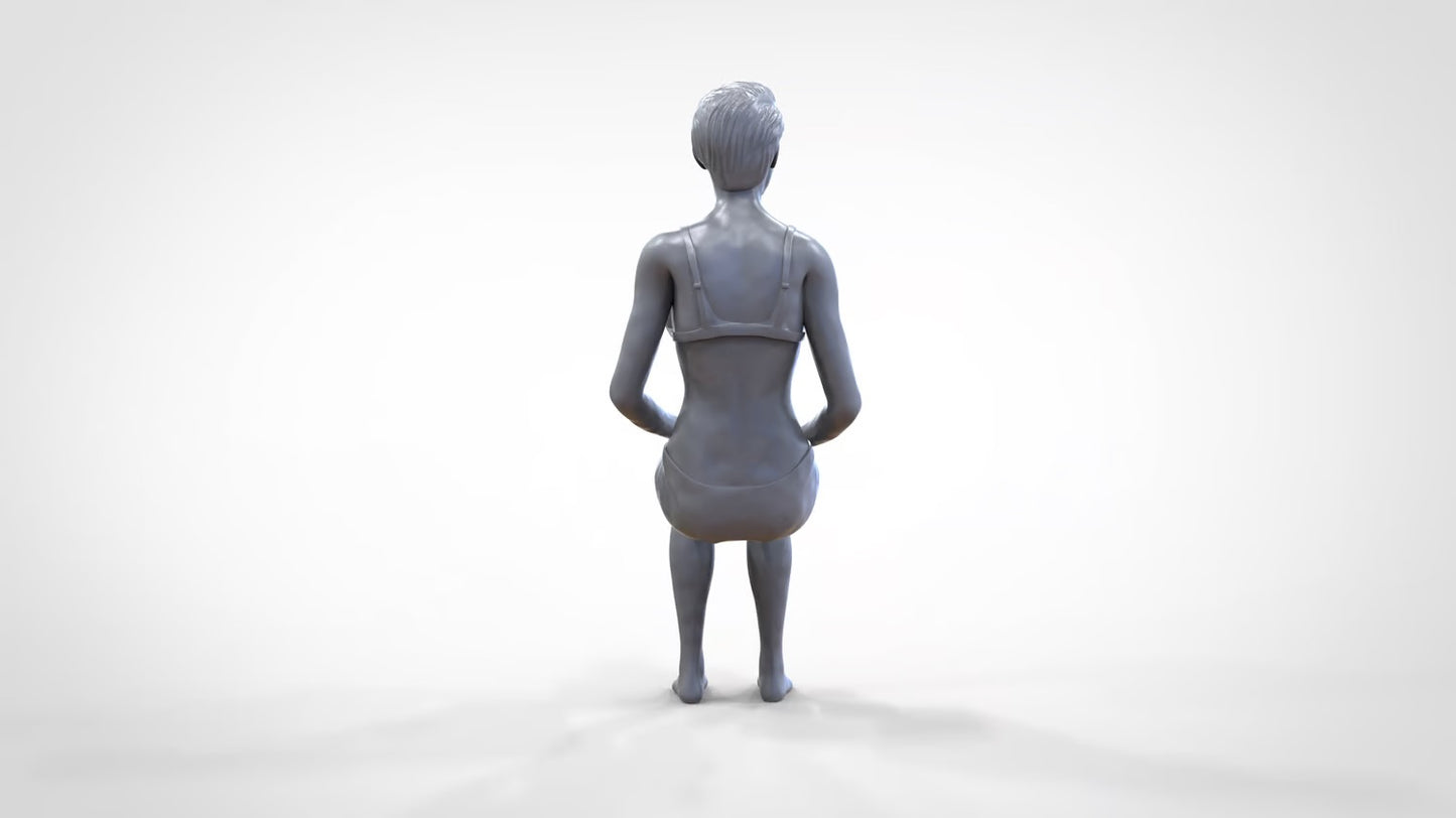 Productfoto 0: Vrouw in bikini - zittend