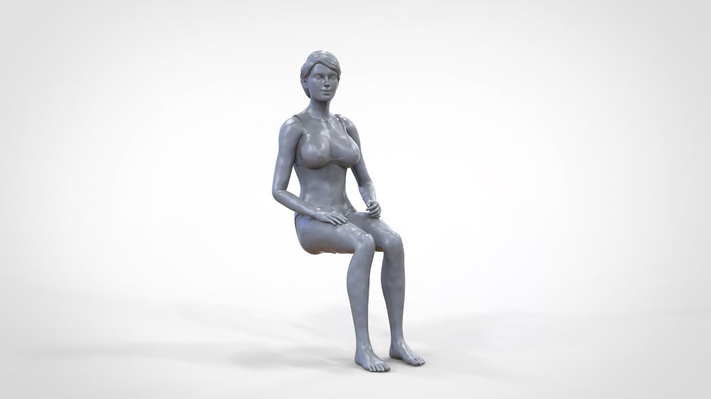 Productfoto 0: Vrouw in bikini - zittend