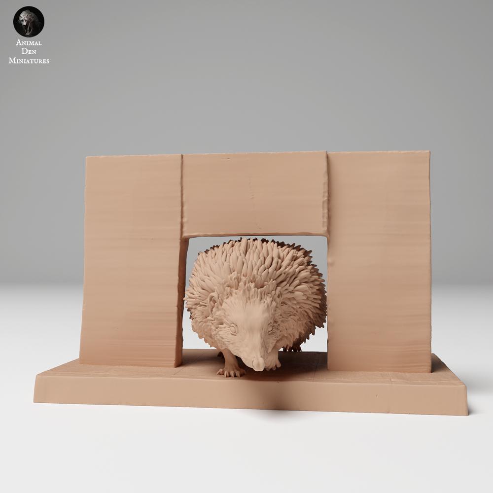 Productfoto 1: Wilddier dierenfiguur: Europese egel - steekt een hek over (24_11_06)