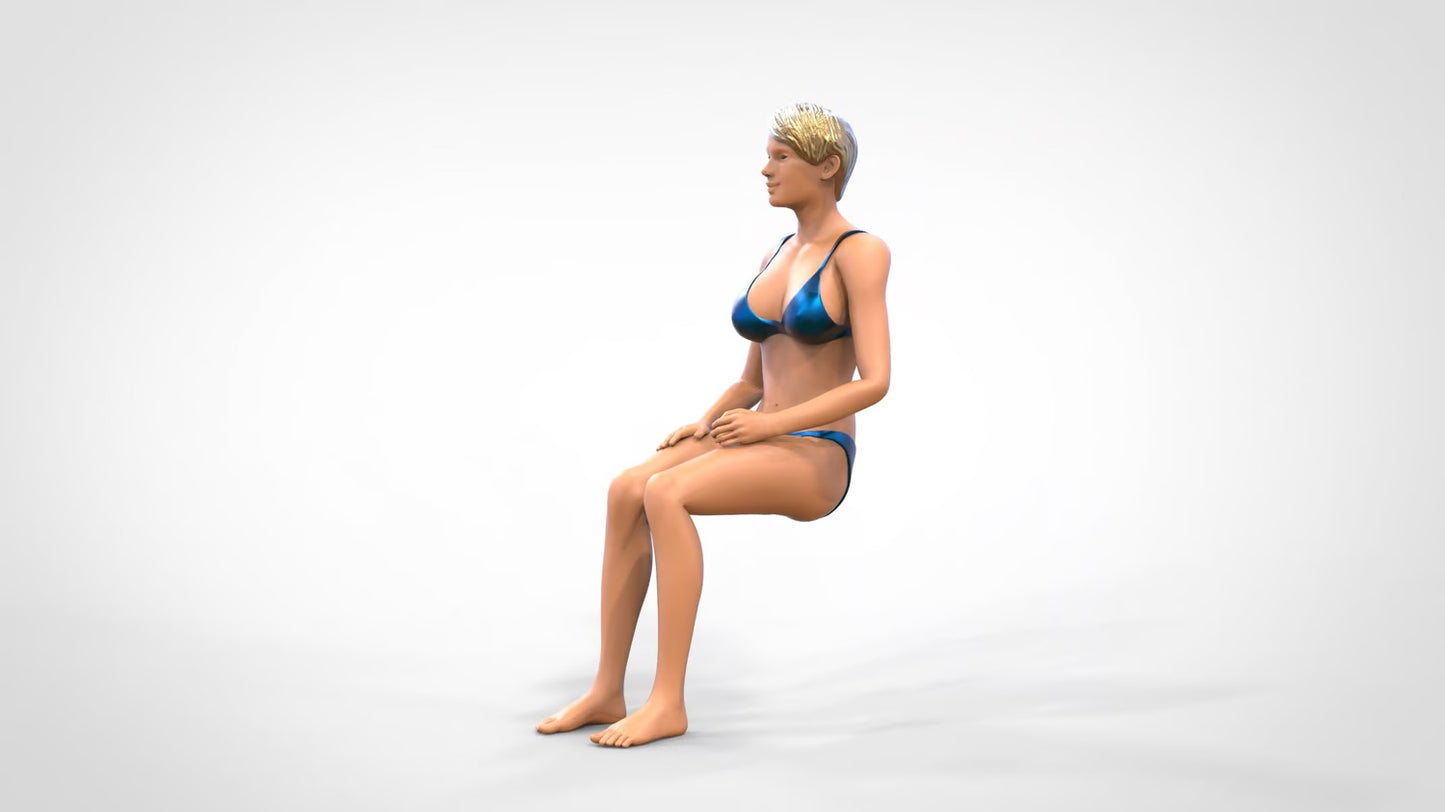Productfoto 0: Vrouw in bikini - zittend
