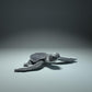 Productfoto dierenfiguur Animal Den Miniatures 1: Zeedierfiguur: zeeschildpadjong dat uit het ei komt (21_12_01)