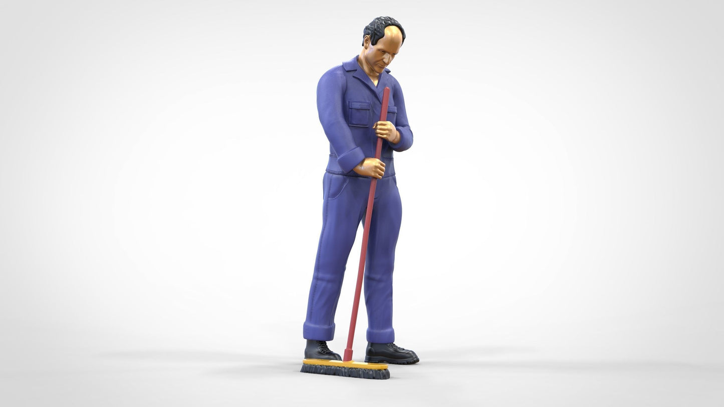 Productfoto 0: Huismeester of schoonmaker: man met bezem in overall