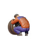 Productfoto 0: Mechanicus knielend: Bandenwissel in de autowerkplaats