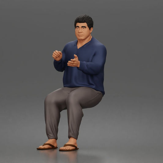 Diorama-modelbouw productfoto 0: Zittende figuur: gebarende man met trui, broek & slippers (a165)